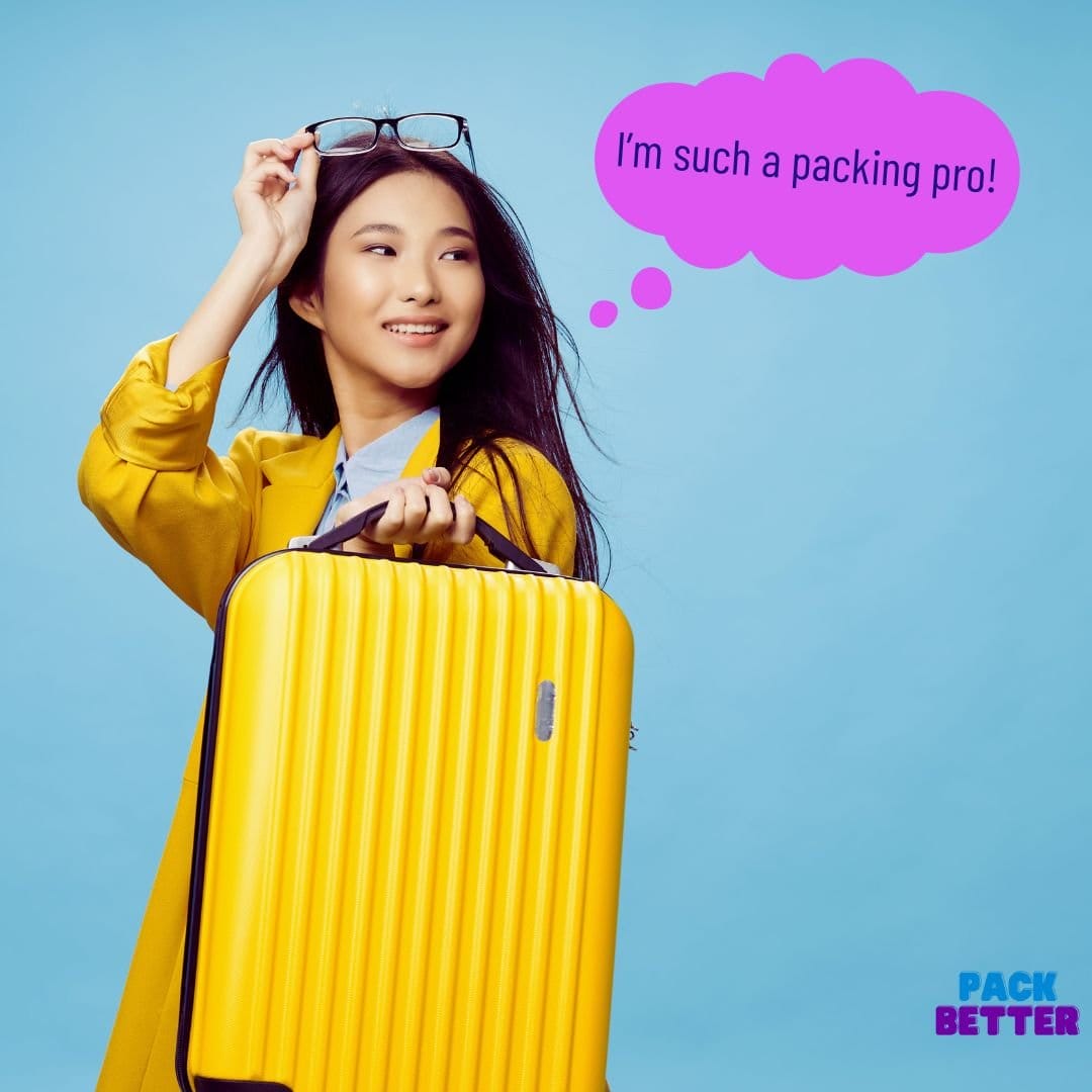 woman holding yellow suitcase
