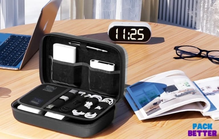 table with clock and electronics organizer on it