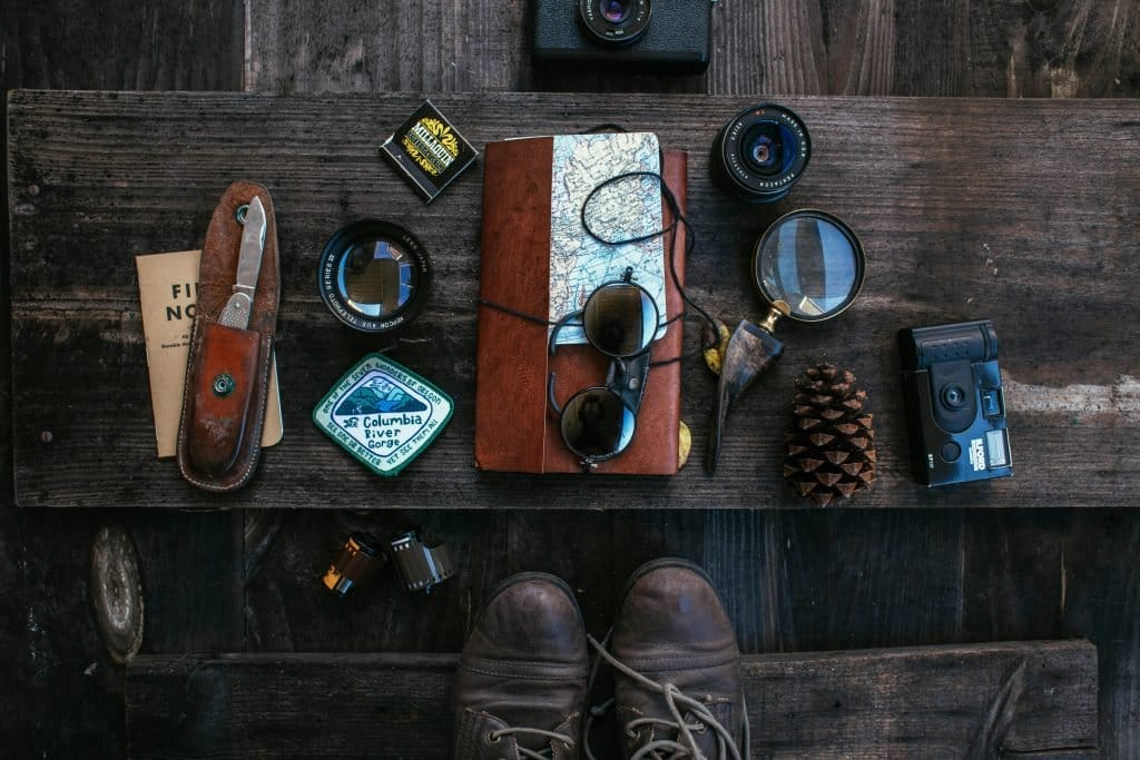 camping gear on wood - top down